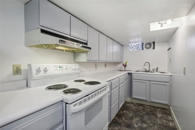 kitchen with gray cabinetry, sink, and white range with electric cooktop