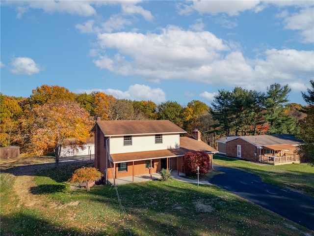 view of front of home with a front yard