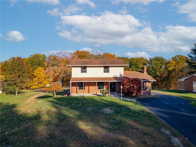 front of property with a front yard