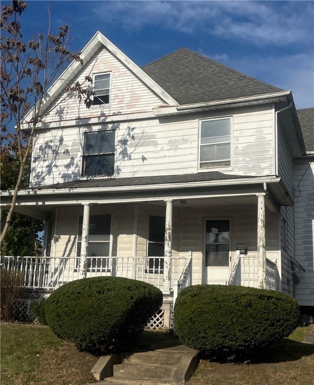 view of front of home featuring covered porch