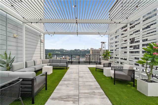 view of patio / terrace with an outdoor hangout area and a pergola