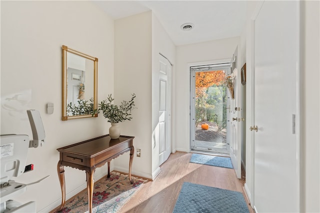 doorway featuring light hardwood / wood-style floors