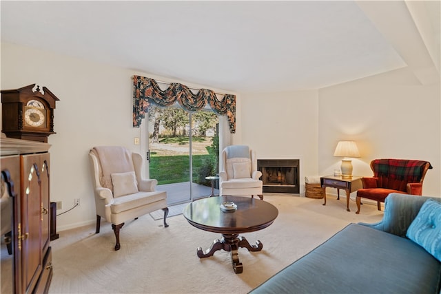 sitting room featuring light colored carpet