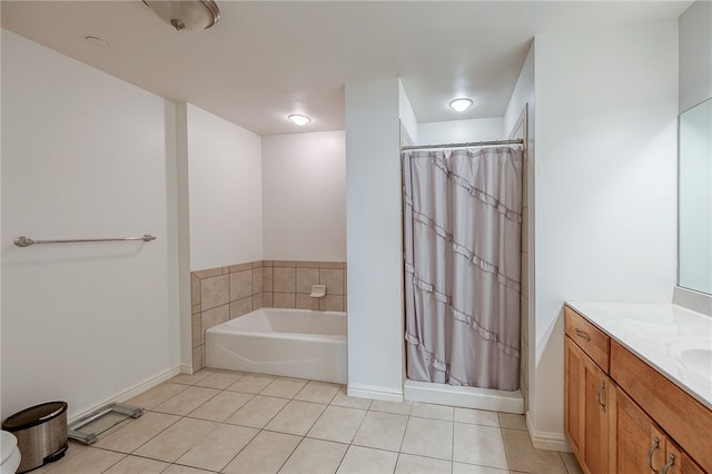 bathroom with vanity, tile patterned floors, and separate shower and tub