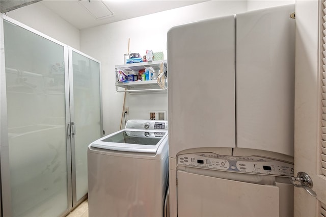 laundry room featuring separate washer and dryer