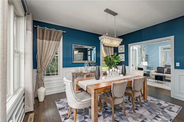 dining area featuring dark hardwood / wood-style flooring