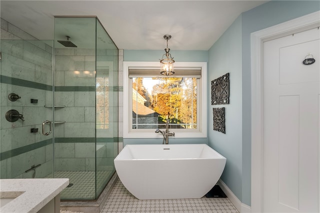 bathroom with vanity, separate shower and tub, and tile patterned flooring