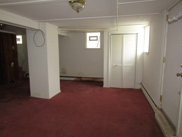 basement with dark colored carpet