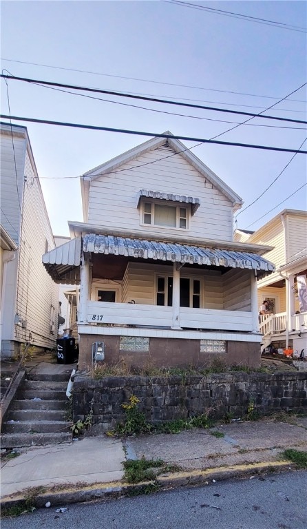 bungalow-style home featuring a porch