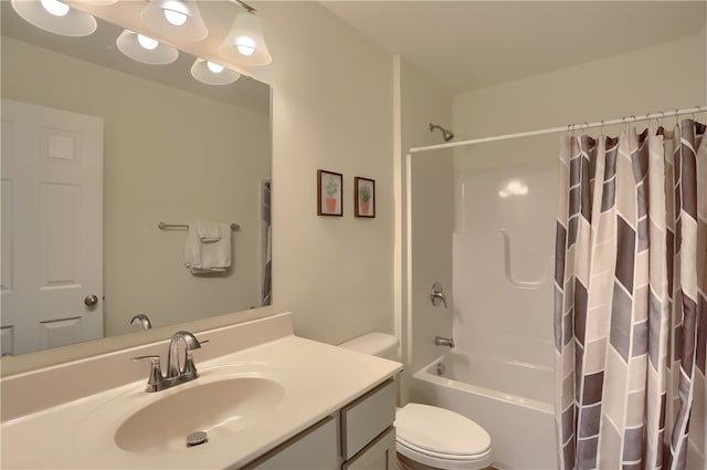 full bathroom featuring vanity, toilet, and shower / bath combo with shower curtain