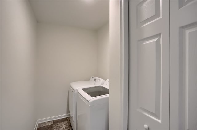 laundry room with independent washer and dryer