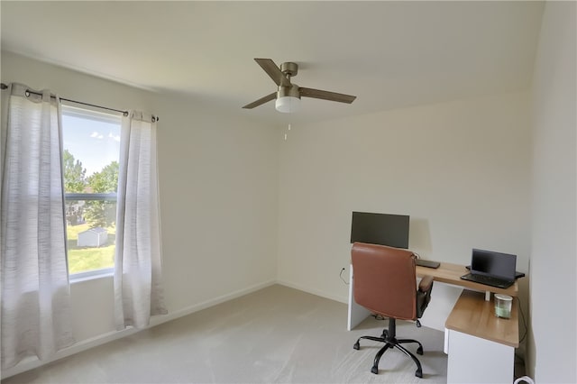 home office featuring carpet and ceiling fan