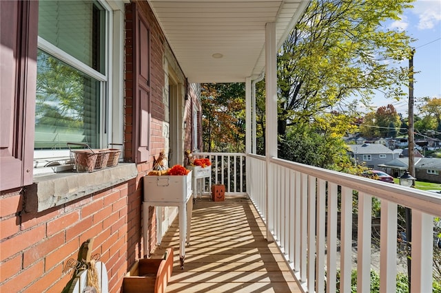 balcony featuring covered porch