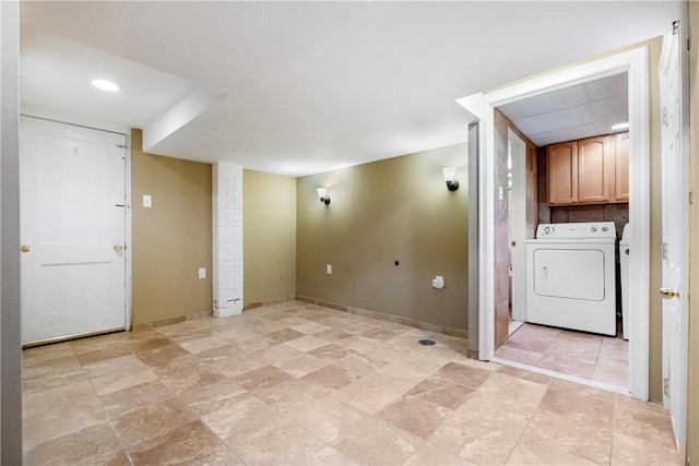 laundry room featuring cabinets