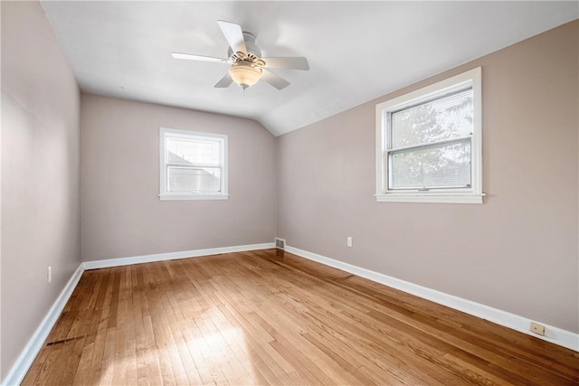 bonus room featuring ceiling fan, lofted ceiling, and light wood-type flooring