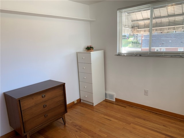 bedroom featuring light wood-type flooring