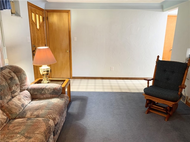 living area featuring light colored carpet