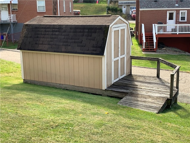 view of outdoor structure with a yard