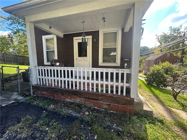 entrance to property with covered porch