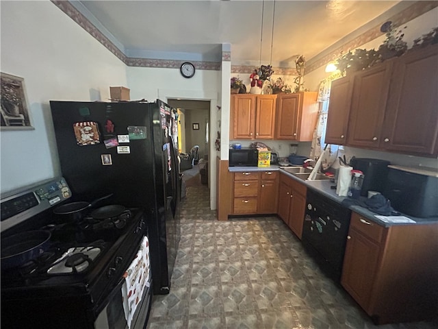 kitchen featuring black appliances and sink