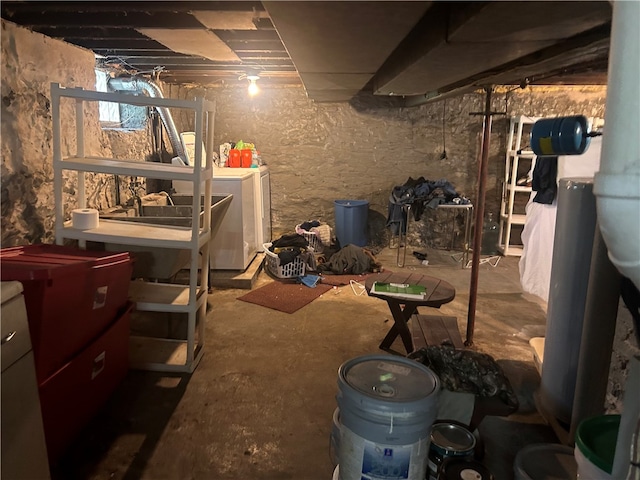 basement with washing machine and clothes dryer