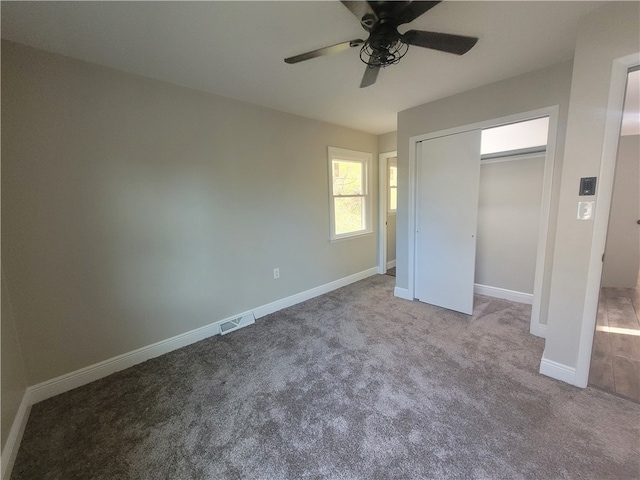 unfurnished bedroom with light carpet, a closet, and ceiling fan