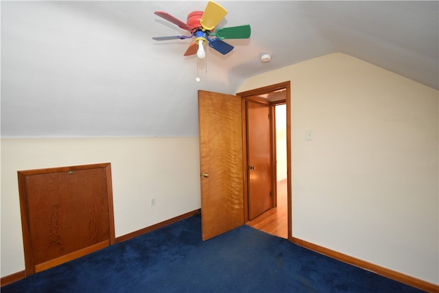 bonus room with ceiling fan, light colored carpet, and vaulted ceiling