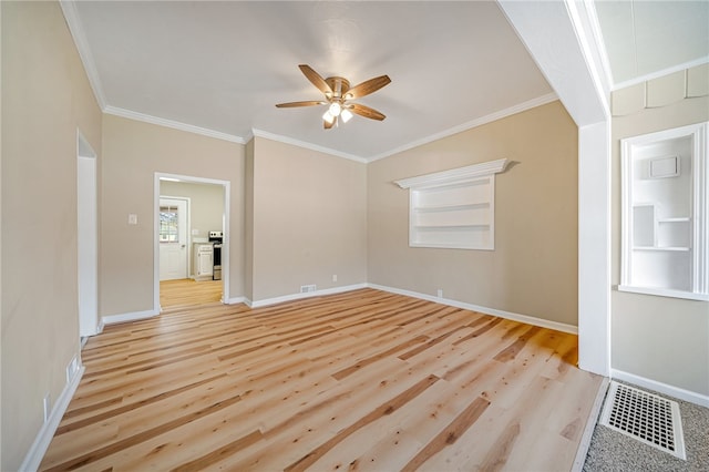 unfurnished room with ornamental molding and light hardwood / wood-style flooring