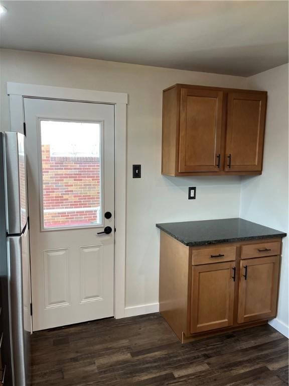 doorway to outside with dark hardwood / wood-style floors