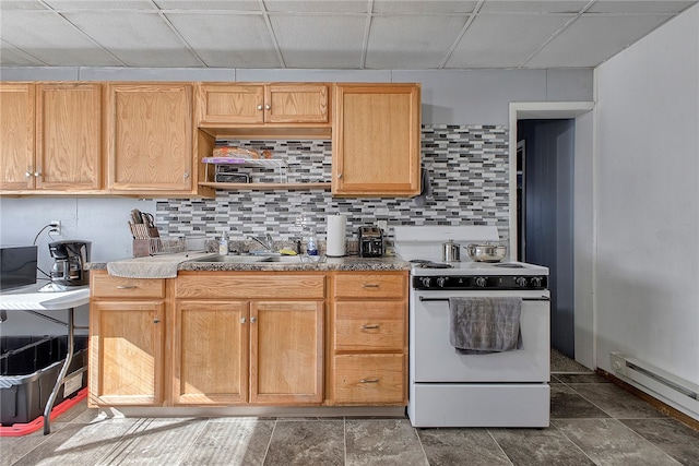 kitchen with backsplash, white range oven, light brown cabinets, and a drop ceiling