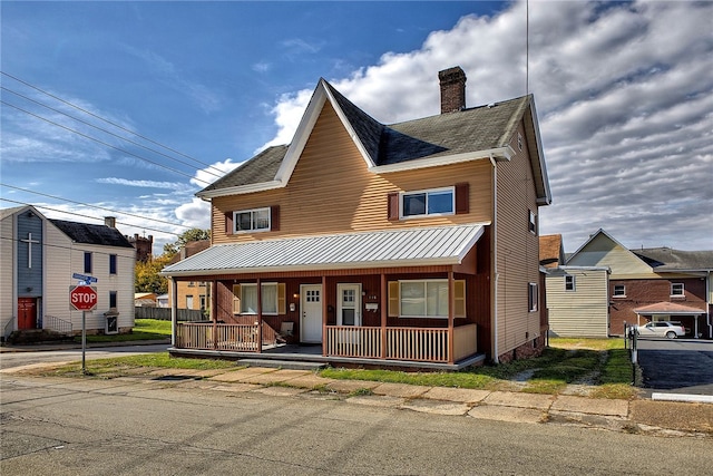 view of front facade featuring covered porch