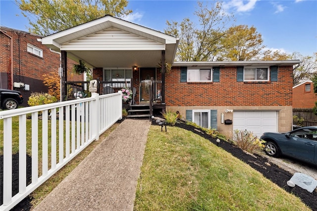 view of front facade featuring covered porch, a garage, and a front yard