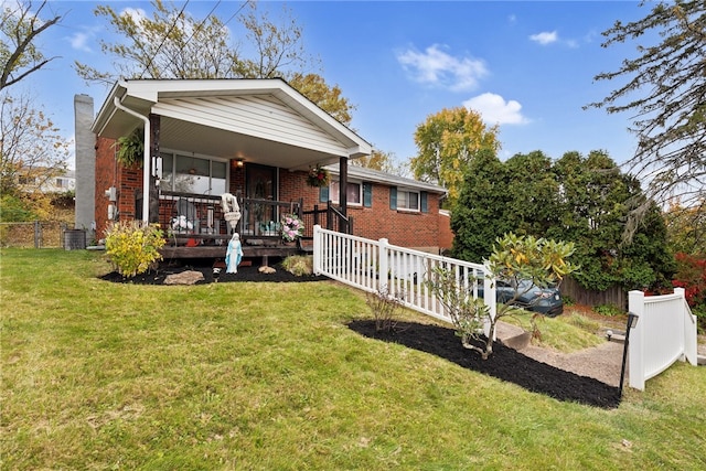 view of front of property featuring a front lawn and a porch