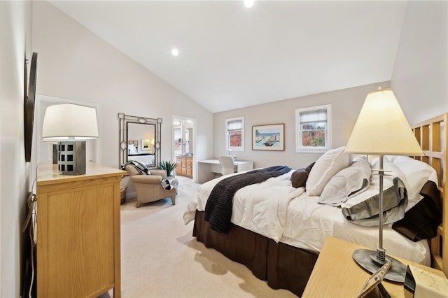 bedroom featuring high vaulted ceiling and light colored carpet