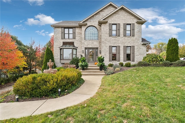 view of front facade with a front lawn