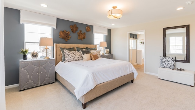 carpeted bedroom featuring recessed lighting, multiple windows, and baseboards