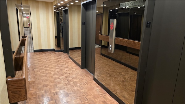 hallway with light parquet flooring