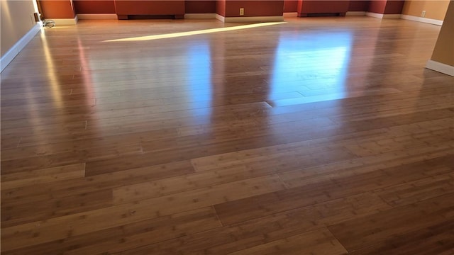 detailed view of wood finished floors and baseboards
