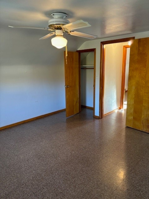 unfurnished bedroom featuring a closet and ceiling fan