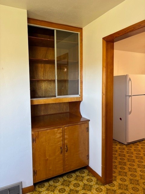 interior space with white refrigerator