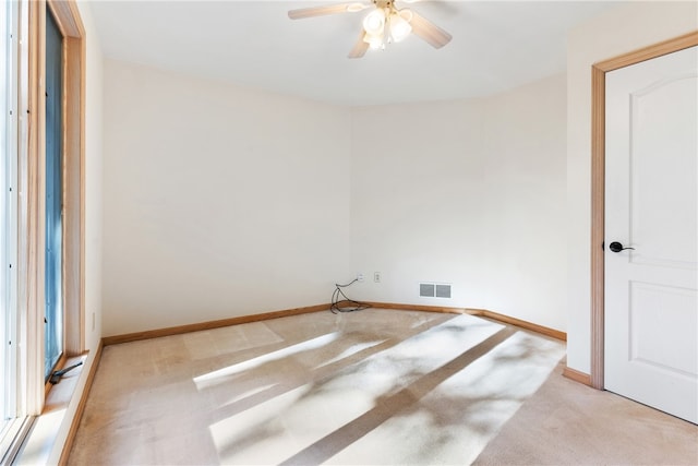 washroom with light carpet and ceiling fan