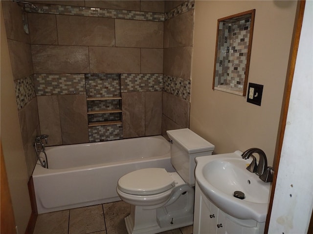 full bathroom with toilet, tiled shower / bath combo, vanity, and tile patterned flooring