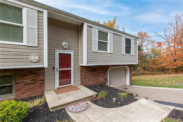 property entrance with a garage