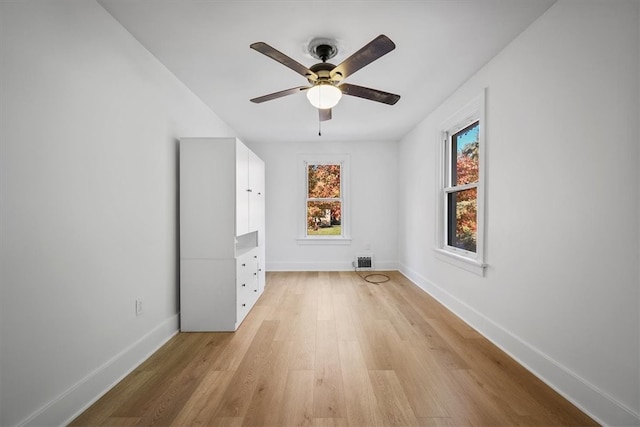 interior space featuring light hardwood / wood-style flooring and ceiling fan