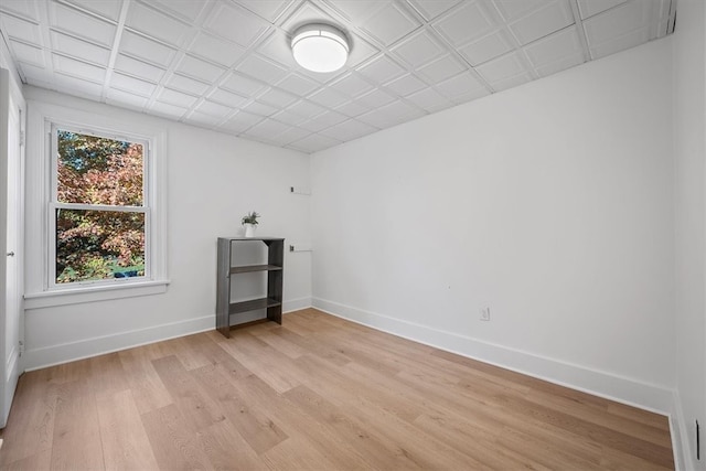 spare room with light hardwood / wood-style flooring