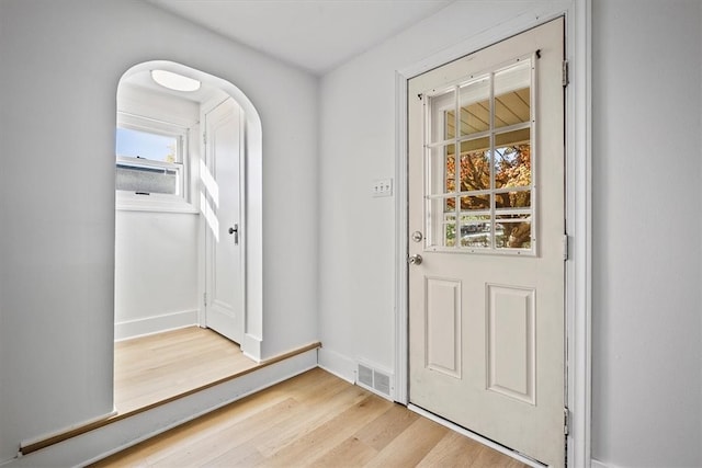 doorway with light hardwood / wood-style floors