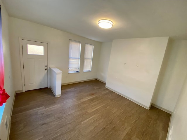 entryway with hardwood / wood-style floors