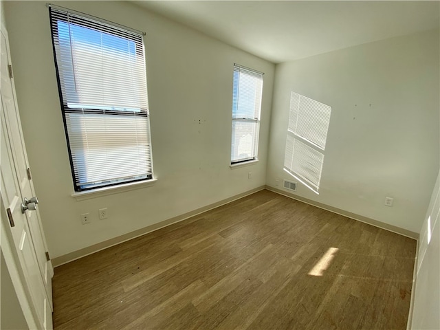 empty room featuring light hardwood / wood-style floors