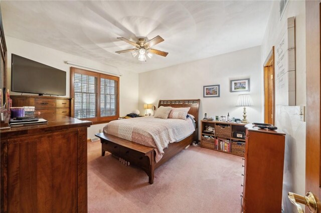 bedroom with carpet floors and ceiling fan