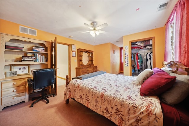 carpeted bedroom with a closet and ceiling fan